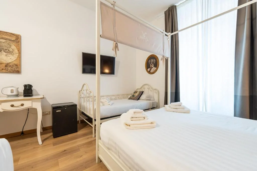 Camera Tripla Deluxe — Popolo Rooms&Suites