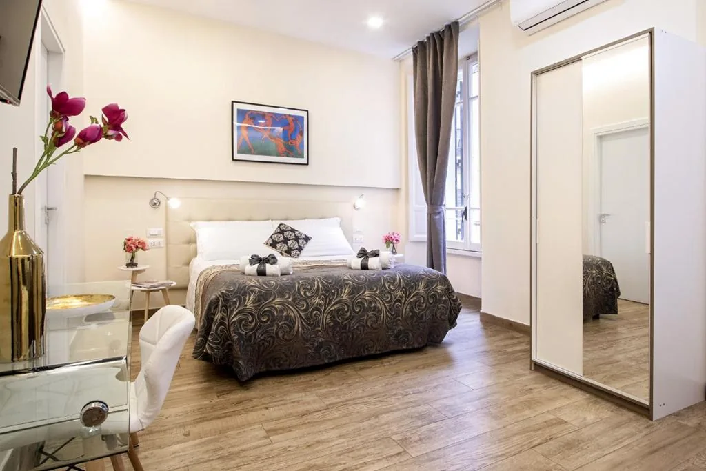 Camera Tripla Deluxe — Quiriti Vatican Relais