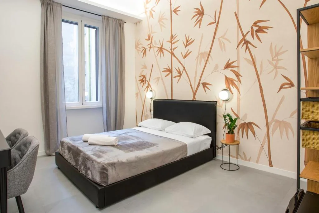 Camera Tripla Deluxe — Re di Roma Luxury Suite