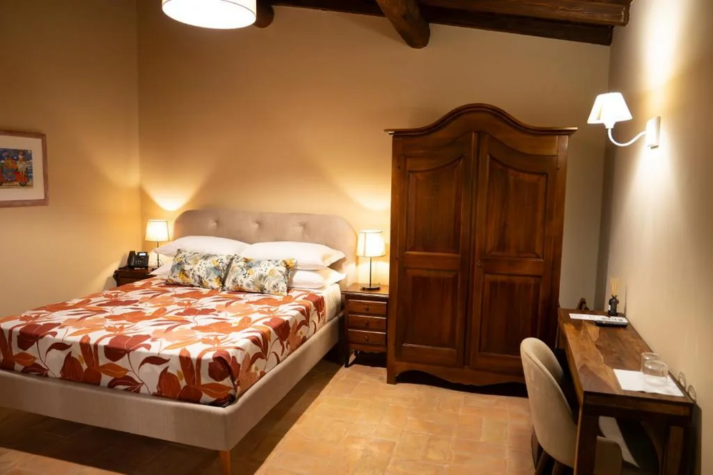 Camera Tripla Deluxe — Relais Santa Caterina Hotel