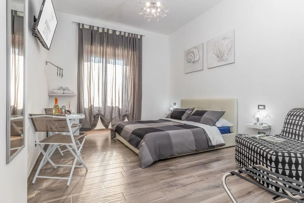 Deluxe Triple Room — Scirocco Rooms