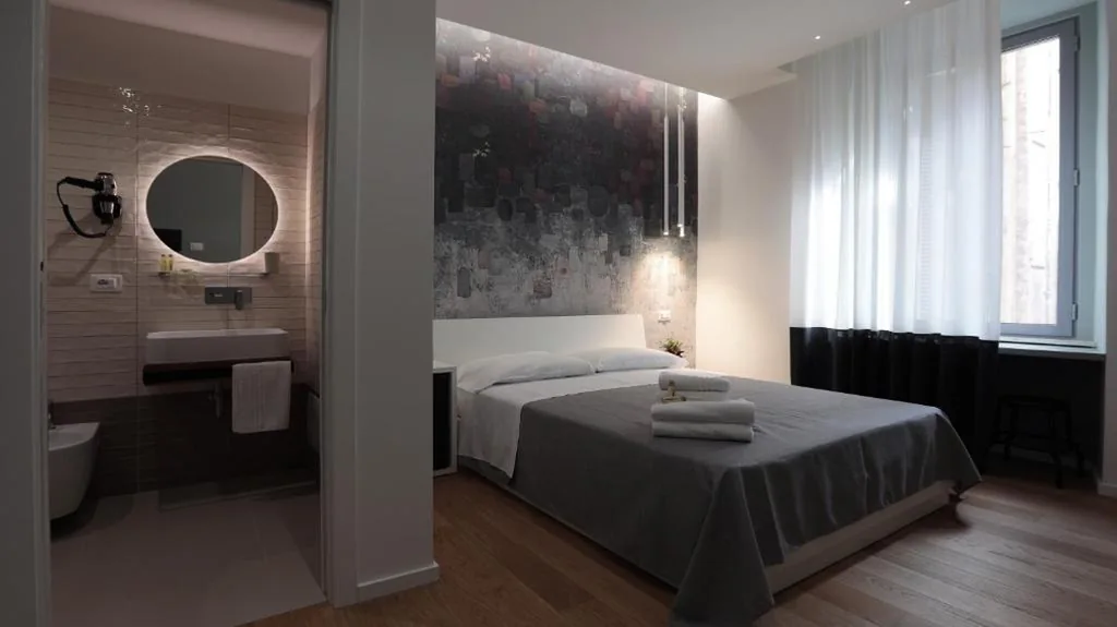 Deluxe Triple Room — Suite Inn Rome