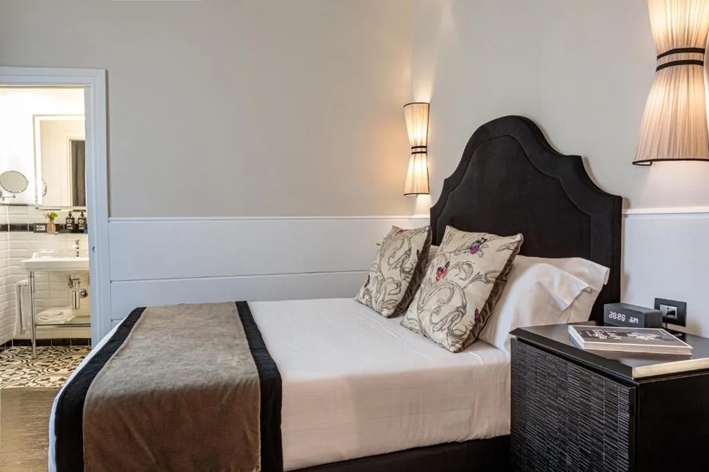 Deluxe Triple Room — The Independent Suites