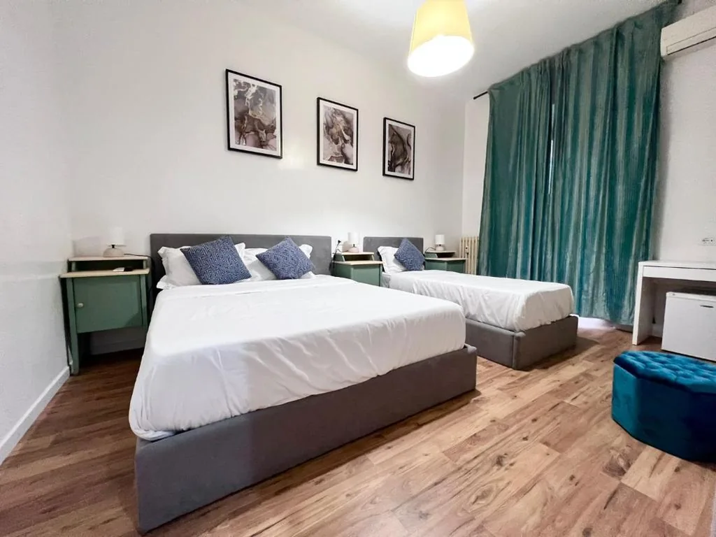 Triple Deluxe Room — The Place In Rome Guest House