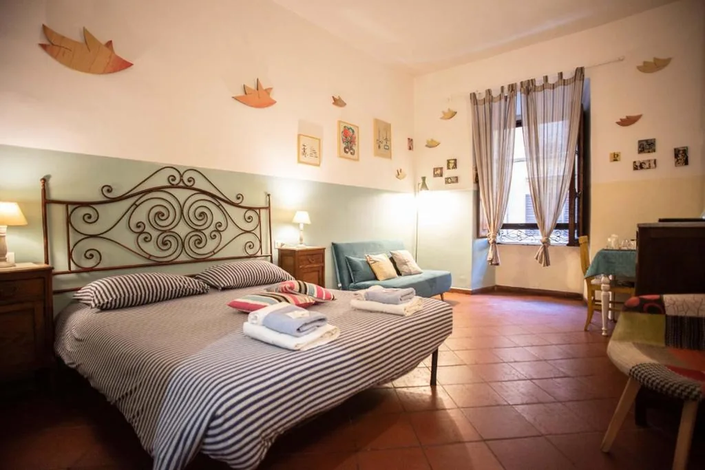 Camera Tripla Deluxe — Trastevere Dream House