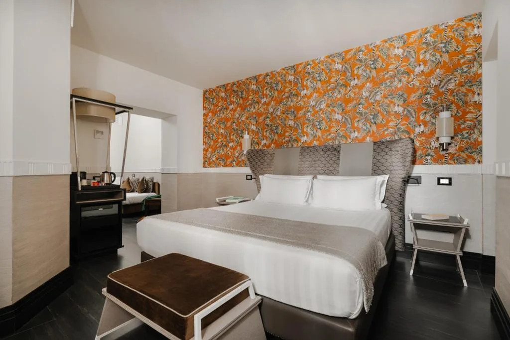 Deluxe Triple Room — Unica Suites Rome