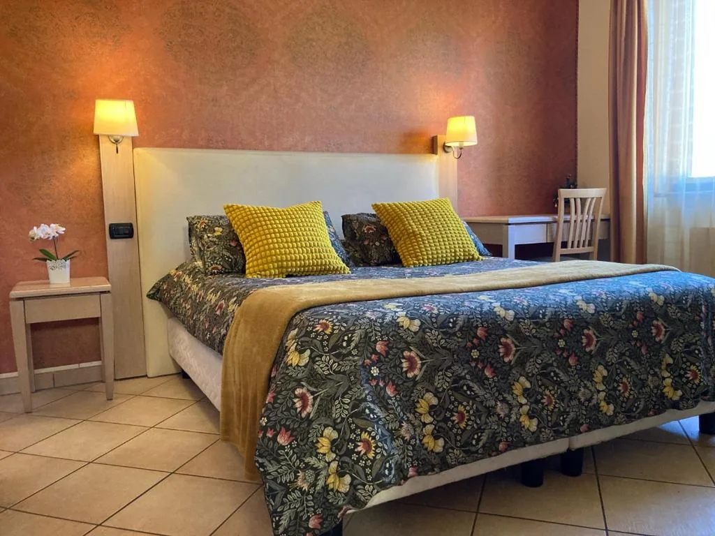 Camera Tripla Deluxe — Villa Rosita