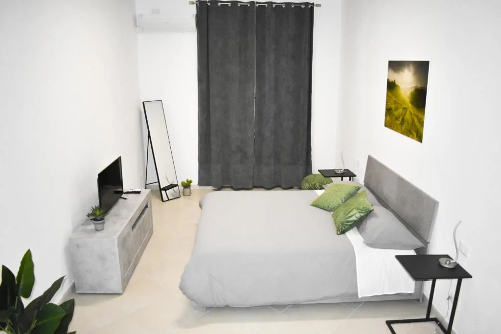 Deluxe Triple Room — Vista sul Forte