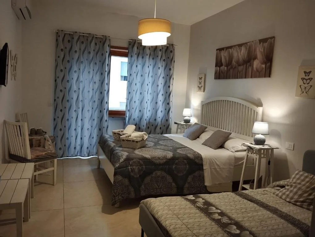 Economy Triple Room with Shared Bathroom — Coffee And The City