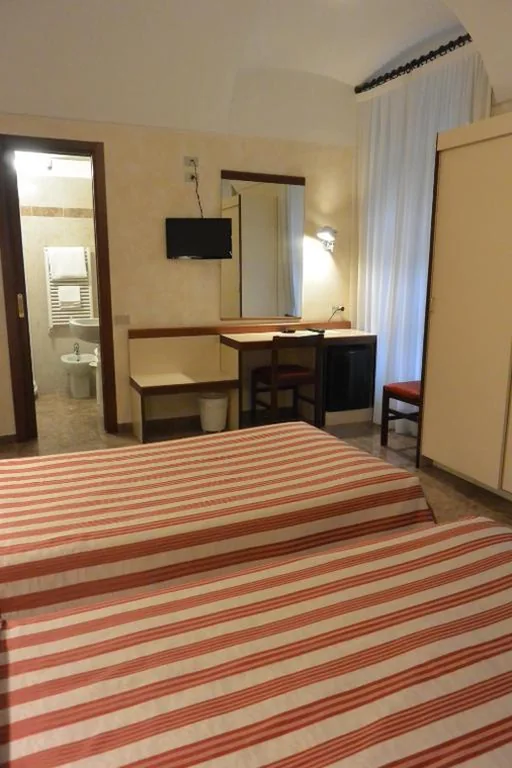 Economy Triple Room — Le Petit Hotel