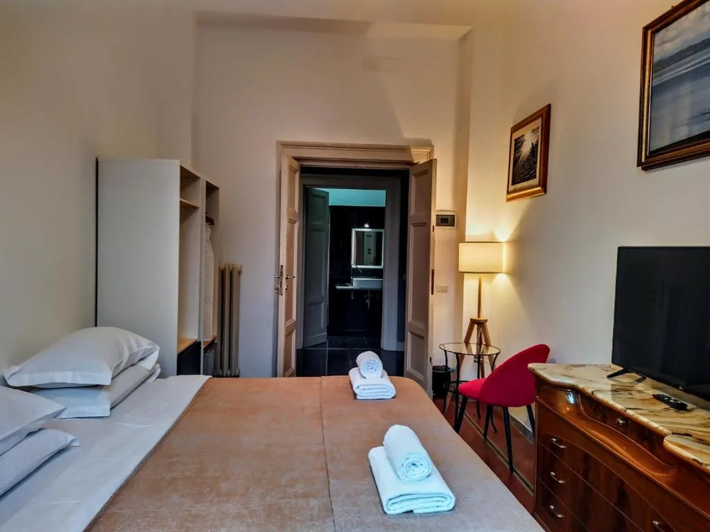Camera Tripla Economy — NIK Rooms