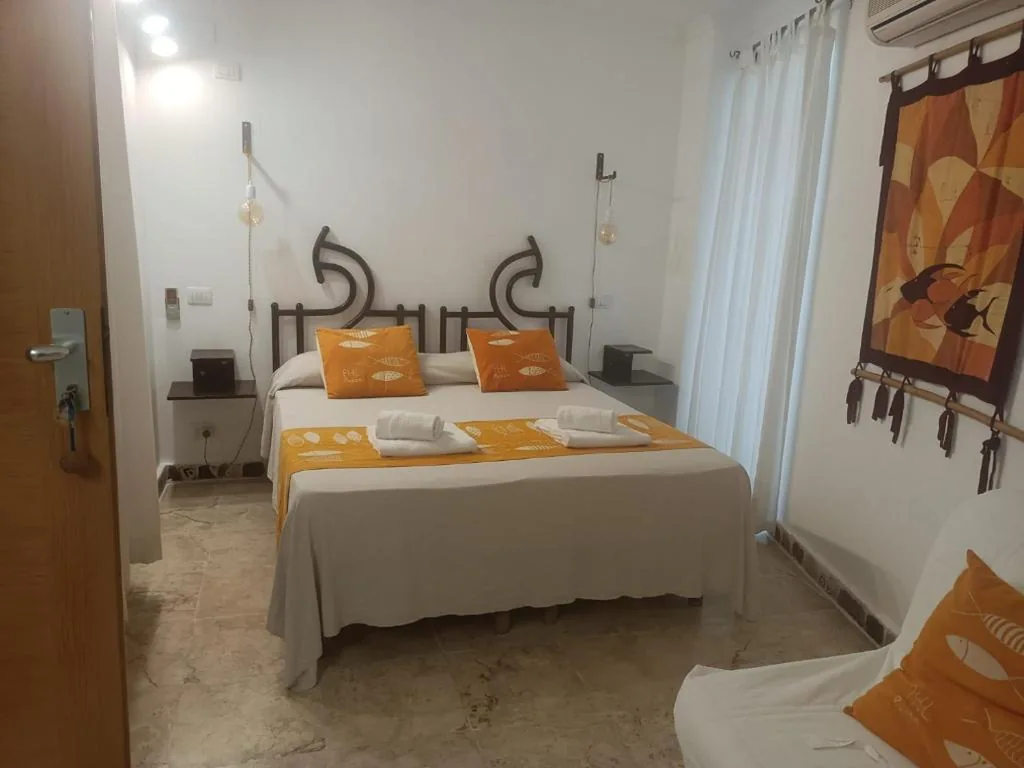 Economy Triple Room — Piccolo Hotel Luisa