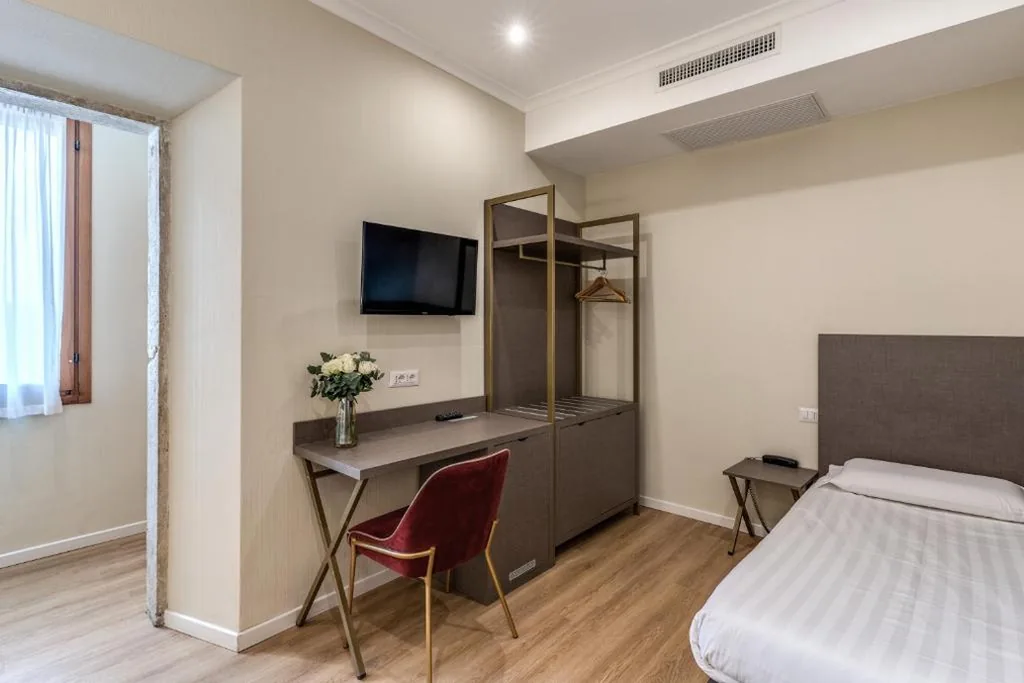 Triple Room — Flower Garden Hotel
