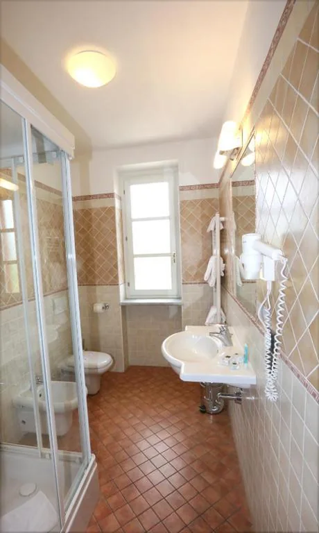 Triple Room — Hotel Barolo