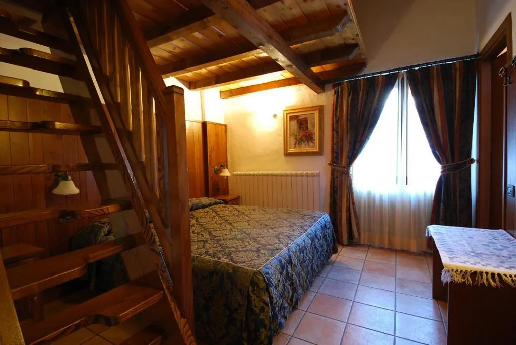 Triple Room — Hotel Bellevue