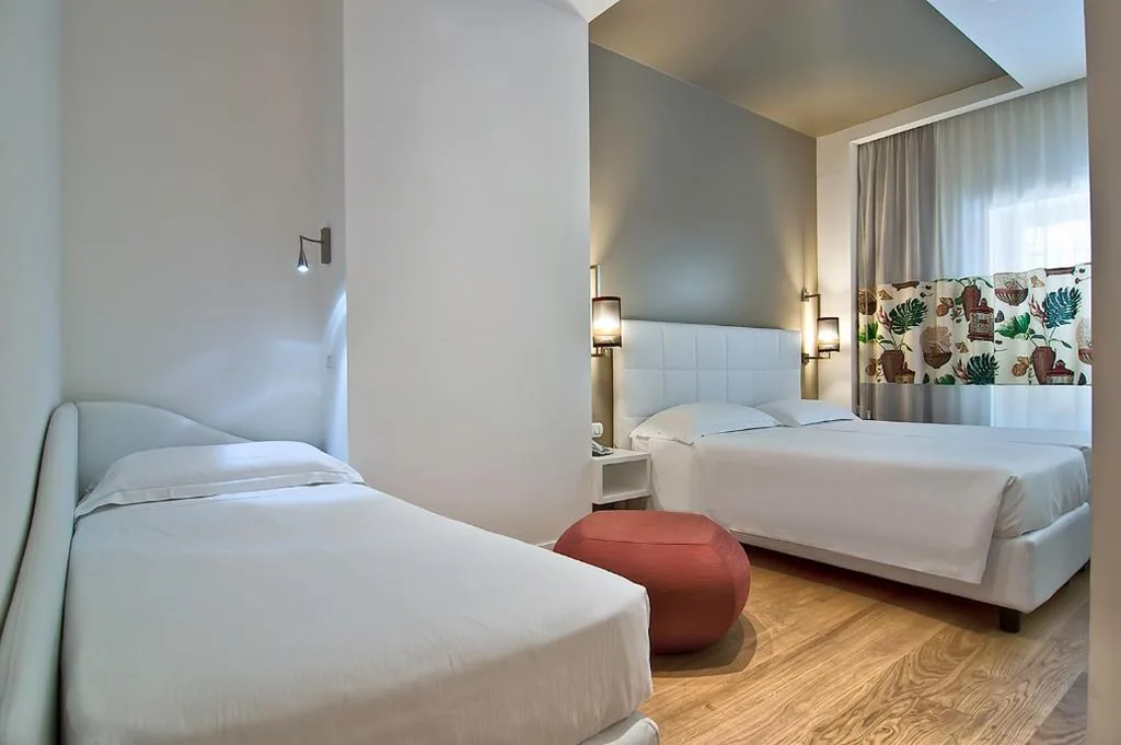 Triple Room — Hotel Caravel