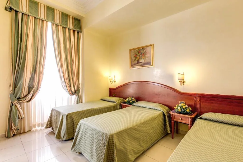 Triple Room — Hotel Contilia