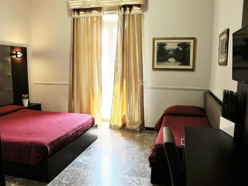 Triple Room — Hotel d’Este