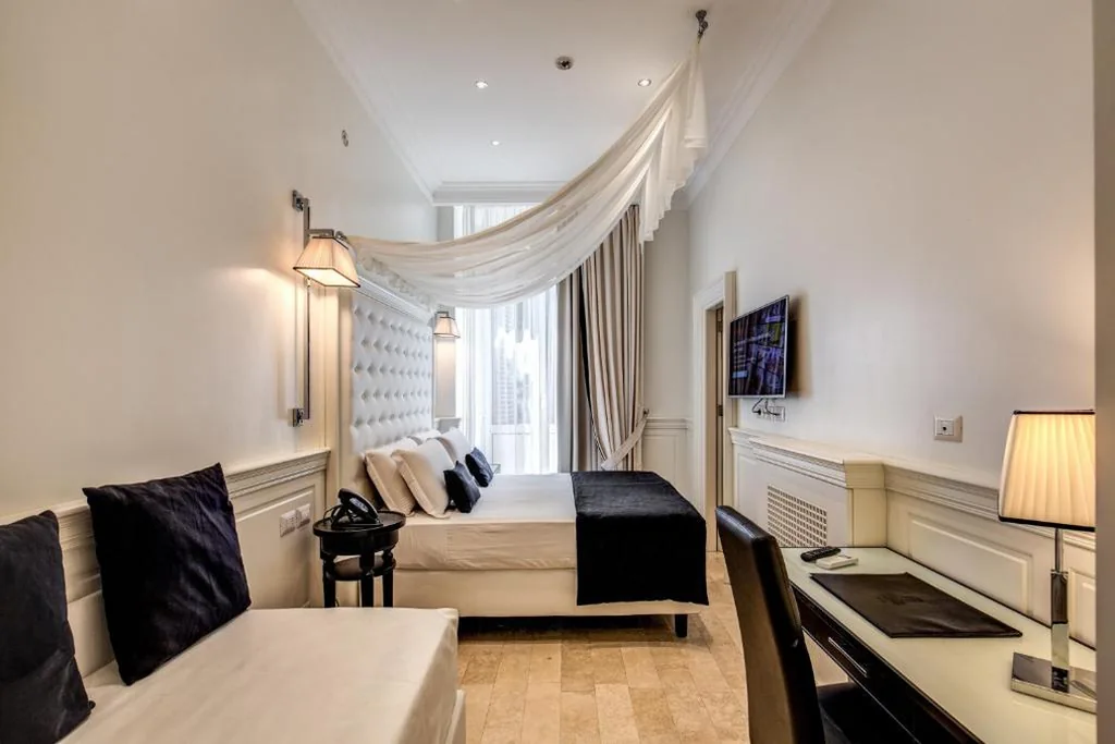 Camera Tripla — Hotel dei Quiriti Suite