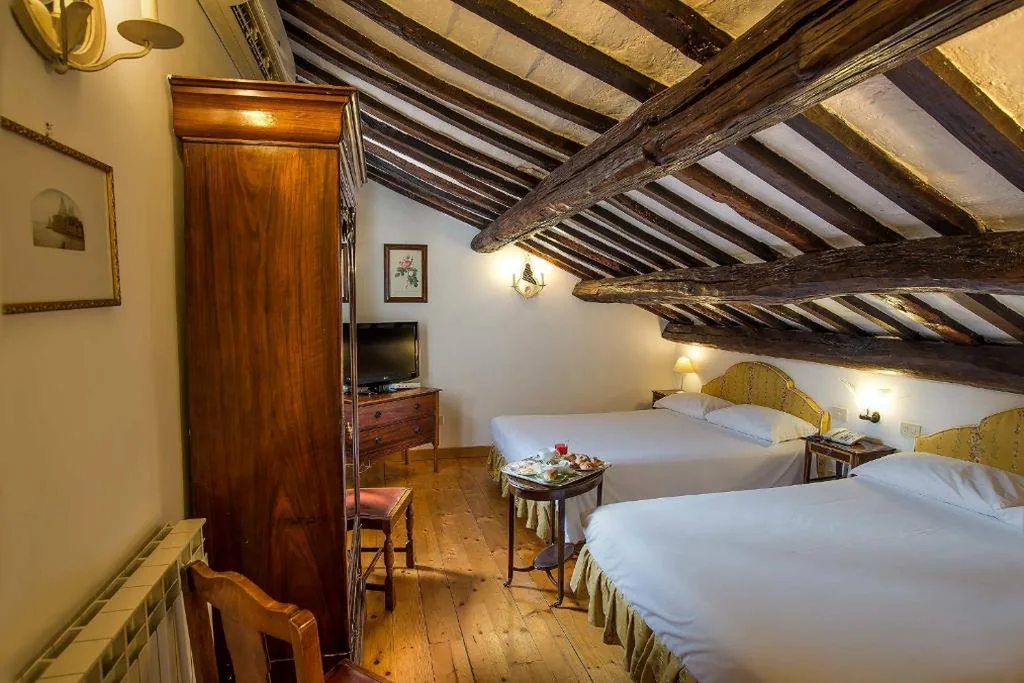 Triple Room — Hotel Fontana