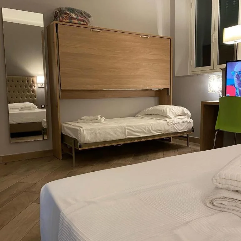 Triple Room — Hotel Genziana