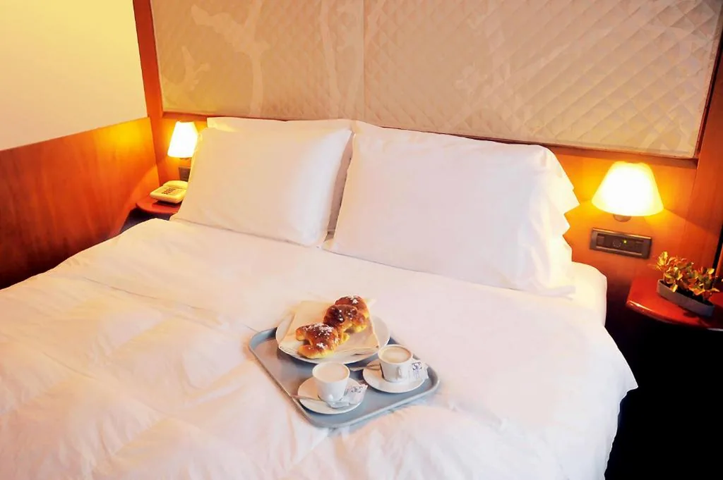 Triple Room — Hotel Giotto