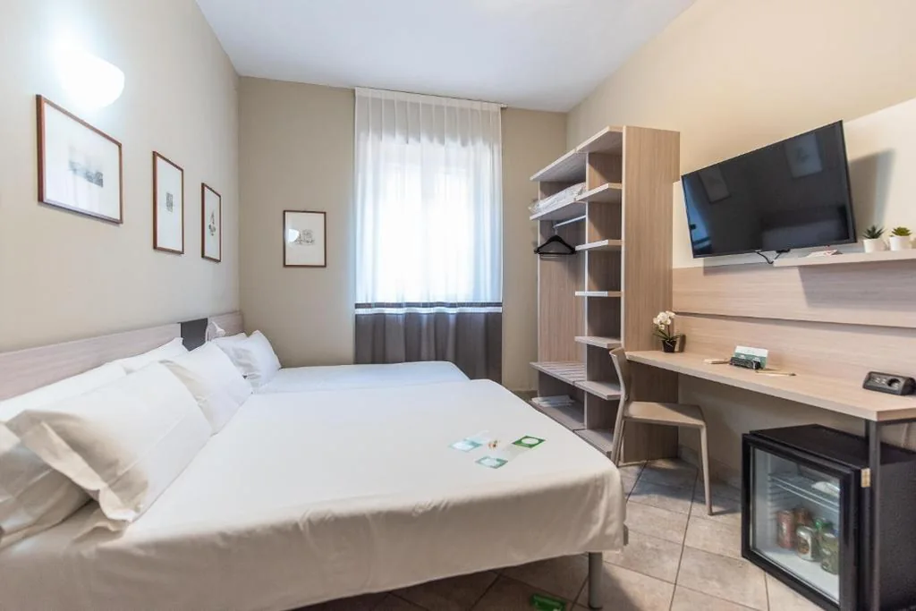 Triple Room — Hotel Gran Torino