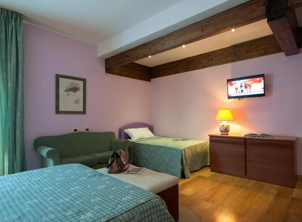 Triple Room — Hotel La Pergola