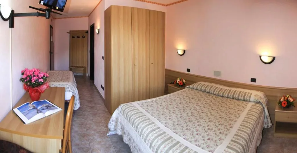 Triple Room — Hotel Les Saisons