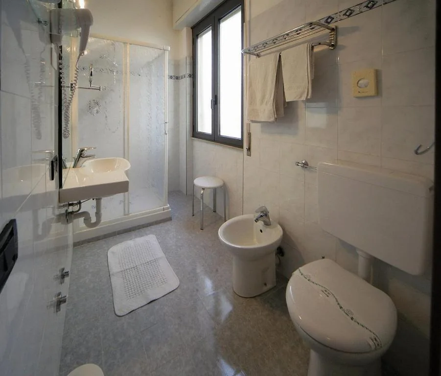 Triple Room — Hotel Marisa