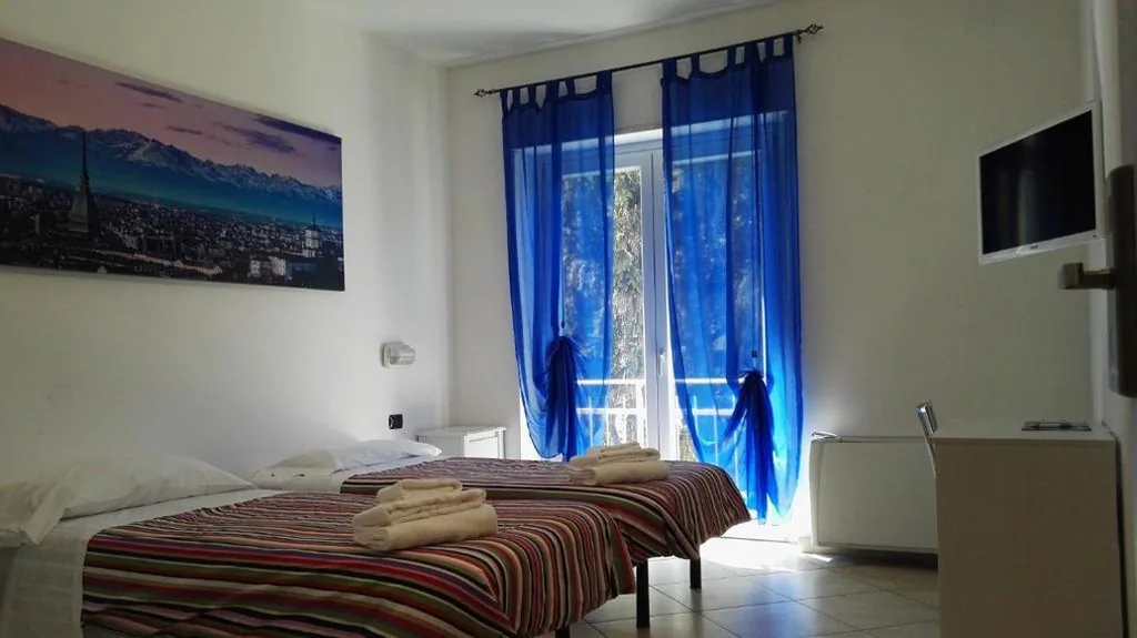 Triple Room — Hotel Paradise