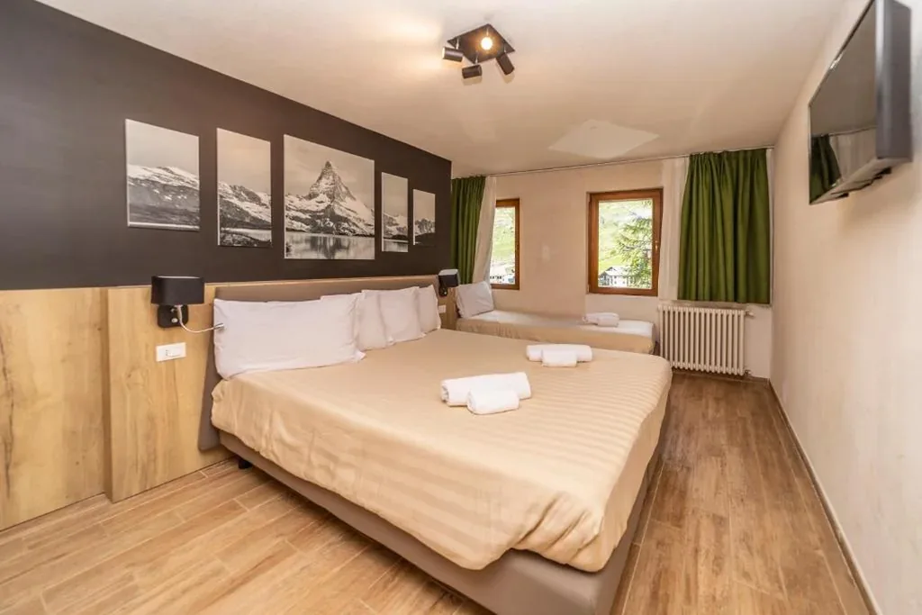 Camera Tripla — Hotel Petit Palais