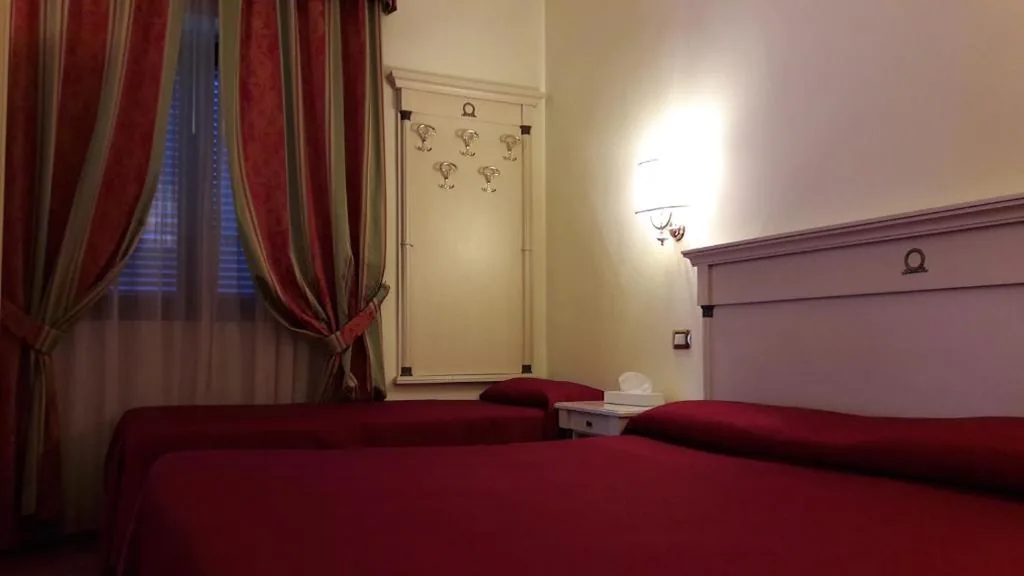 Triple Room — Hotel Quadrifoglio by Mancini