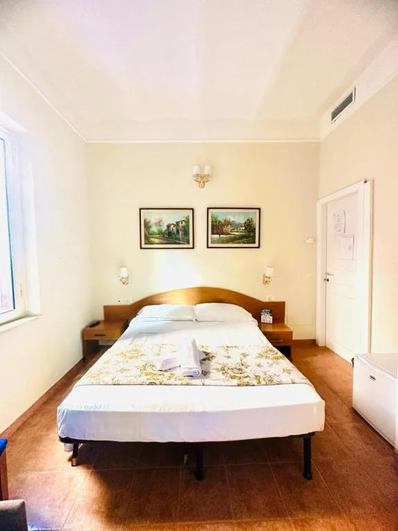 Triple Room — Hotel Resi