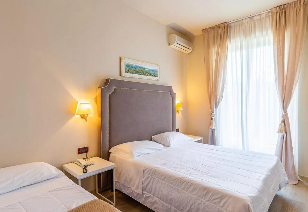 Triple Room — Hotel Rosa Dei Venti