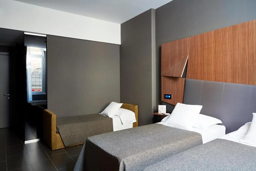 Triple Room — Hotel The Building