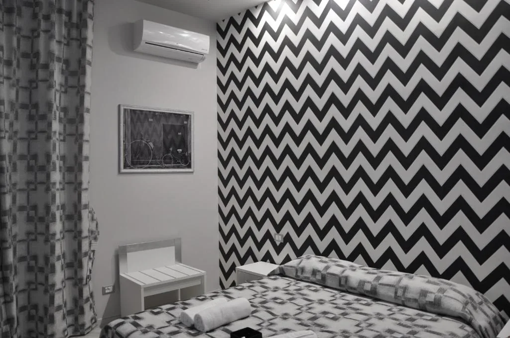 Camera Tripla — Il Corso Suite