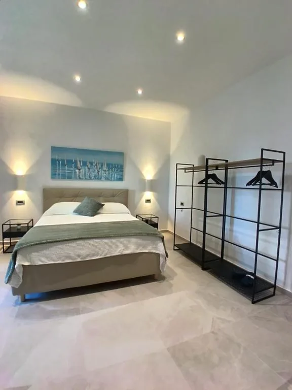 Camera Tripla — La Nassa Rooms Free Parking