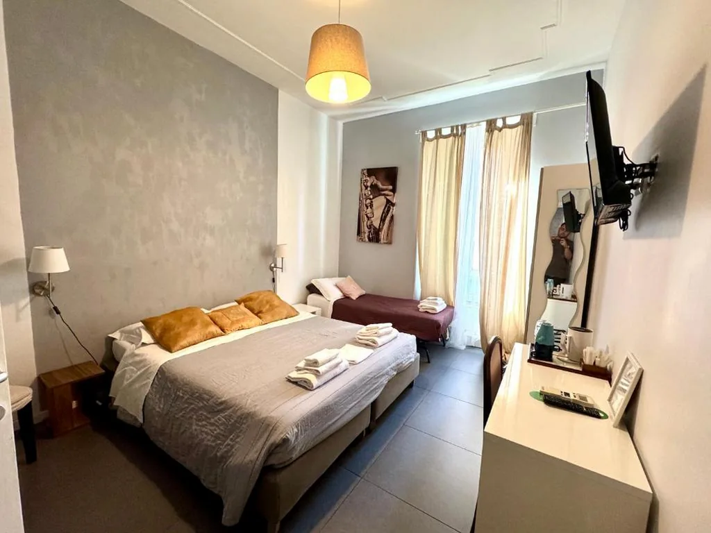 Triple Room — Le Due Civette Roma