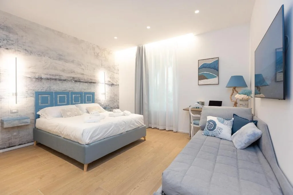 Camera Tripla Luxury — ARIOSTO’S Luxury Rooms