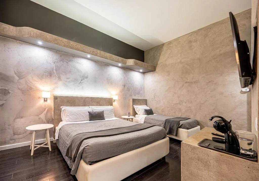 Camera Tripla Luxury — Four Rivers Suites