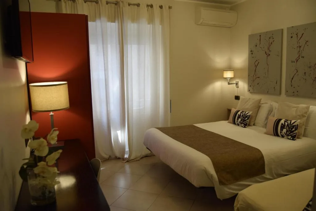 Camera Tripla Luxury — Holiday a San Pietro