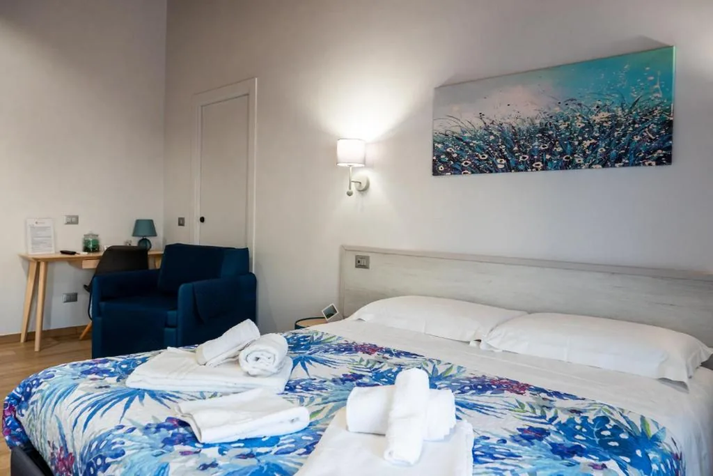 Camera Tripla Luxury — Il Beccaria Relais B&B