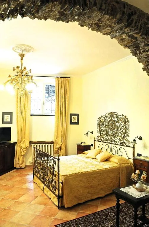 Camera Tripla Luxury — Il Giardino Incantato
