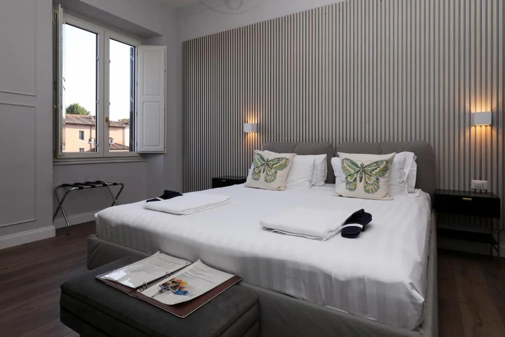 Luxury Triple Room — Rome Plaza Suites, Luxury Collection