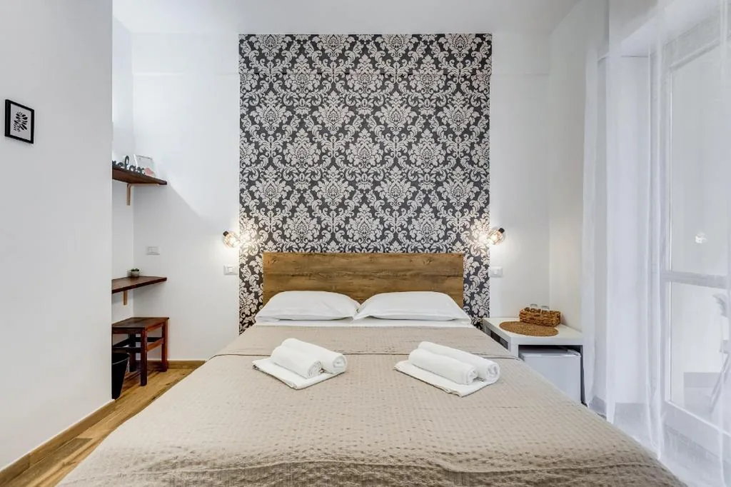 Camera Tripla Luxury — VATICANDREAM GUEST HOUSE