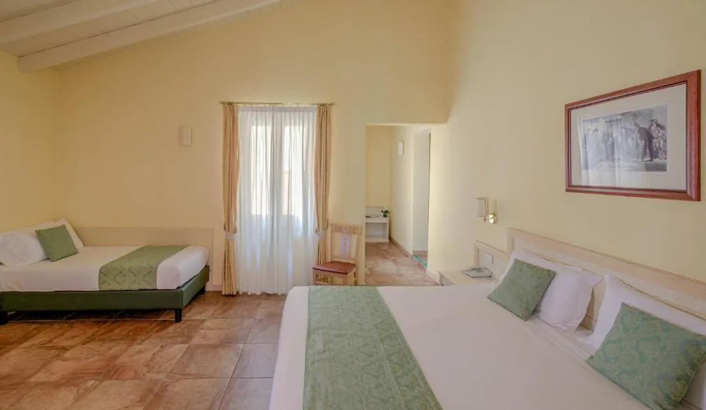 Camera Tripla Mansardata — LVG Hotel Collection – Belvedere San Gottardo