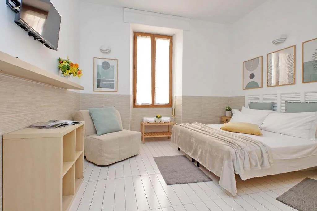 Triple Room — Opera Inn Suites – Rooms and Apartments