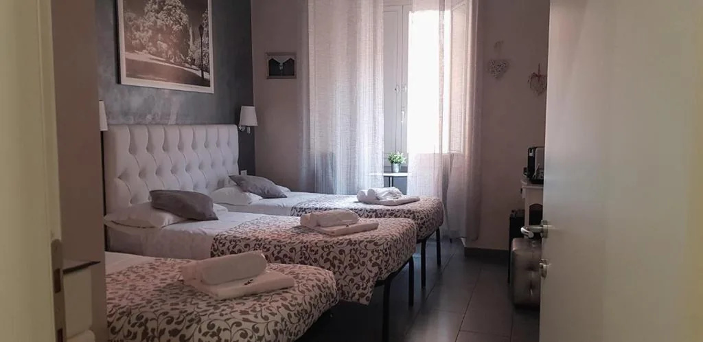 Camera Tripla — Relais Cavour Inn