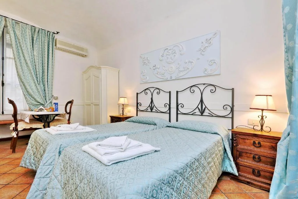 Camera Tripla — Scipioni Suites